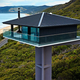 Image for article titled This Cool Coastal House Looks Like It's Floating Over The Ocean